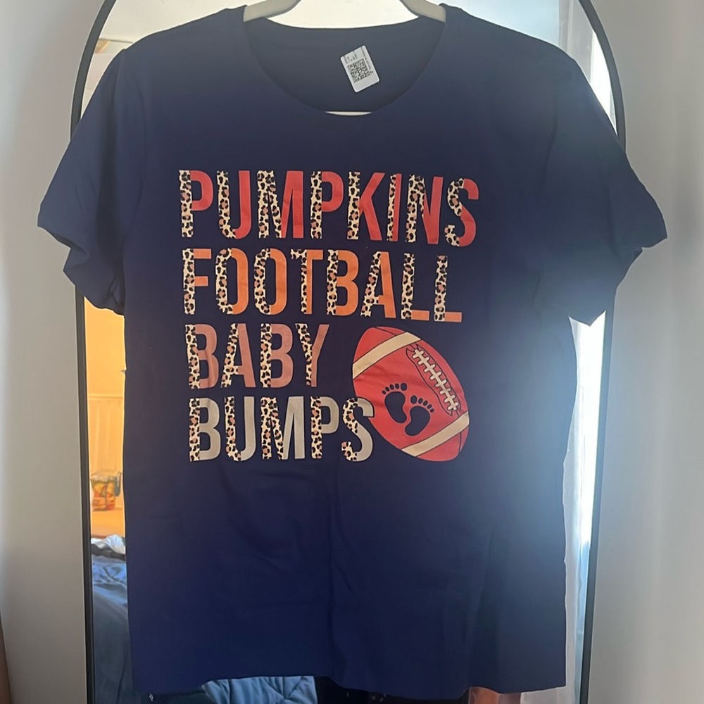 Pumpkins, Football, Baby Bumps T shirt. Never worn.